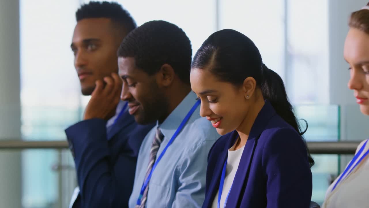 Business people writing on notepad in the business seminar 4k