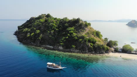 pulau kelor island in indonesia, shot from a drone circling around it to showcase its beauty from all angles