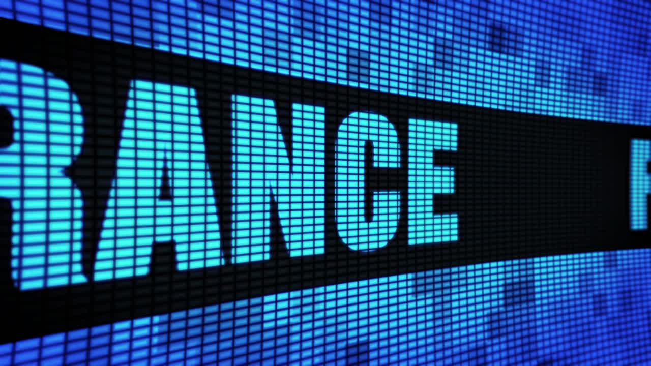 Text displayed on an LED screen with the words FINANCE.