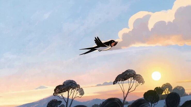 Swallow crossing the sky at dawn