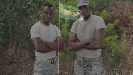 standing confidently with arms crossed, soldiers in camouflage uniforms outdoors