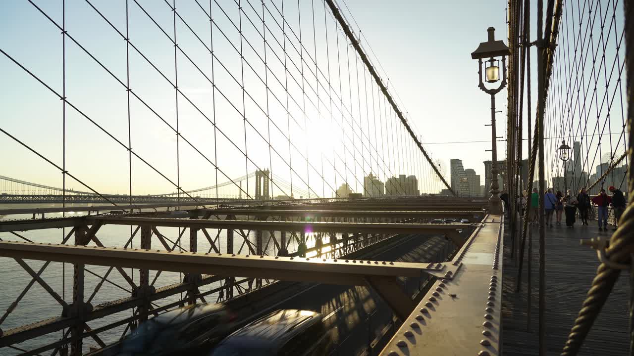 Suspension Cables of Brooklyn Bridge - one of the most Iconinc Places in New York City with a Glimpse of Manhattan Bridge in the Distance
