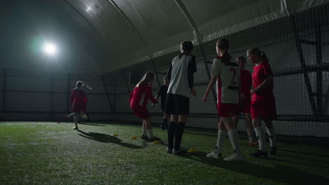 women's soccer team practice indoors