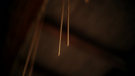strings hanging from ceiling