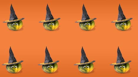 seamless pattern animation with 2 rows of pumpkins with googly eyes and witch hats. halloween concept with copy space on orange background