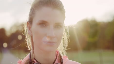 handheld view of serious woman after jogging training