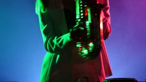 woman playing saxophone in neon lights