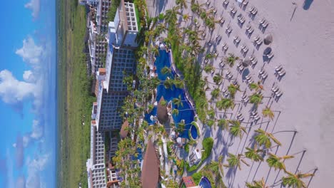 Tropical-Palm-Trees-At-The-White-sand-Beach-In-Front-Of-Hyatt-Ziva-Cancun-Resort-In-Summer