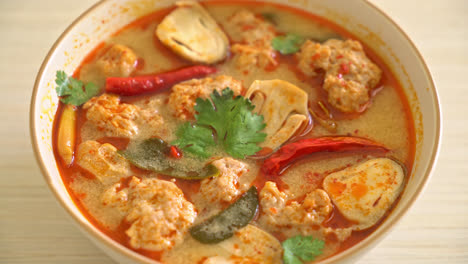 spicy boiled pork soup with mushroom - tom yum - asian food style