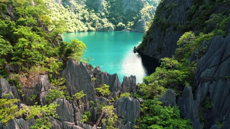 4k drone entering barracuda lake, coron, palawan, philippines