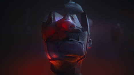 crushed and burned android head on spike in hell