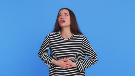 sick ill caucasian woman suffering from period cramps stomach abdominal ache menstrual pain diarrhea