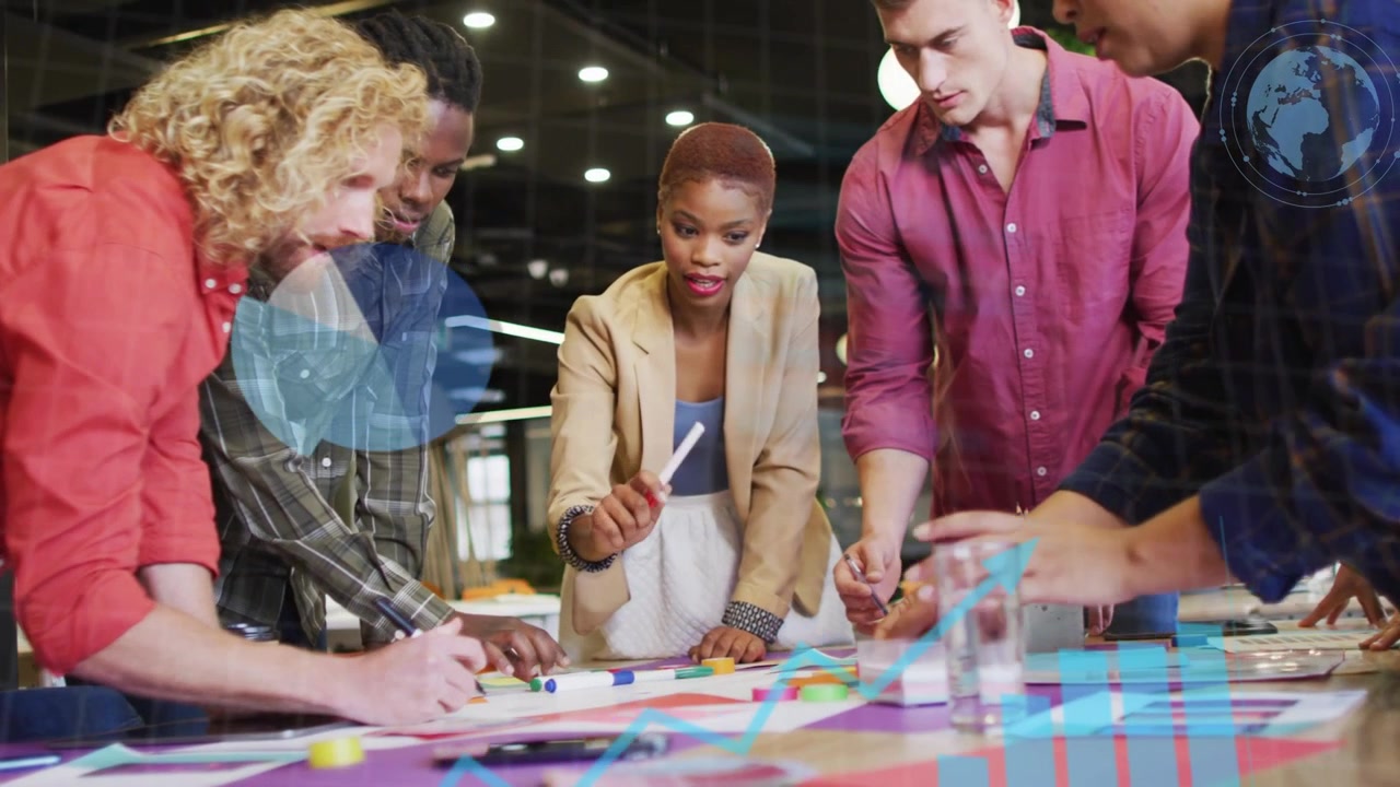 Team of five leaning over table sparking chart overlay as lead woman pointing guiding business plan