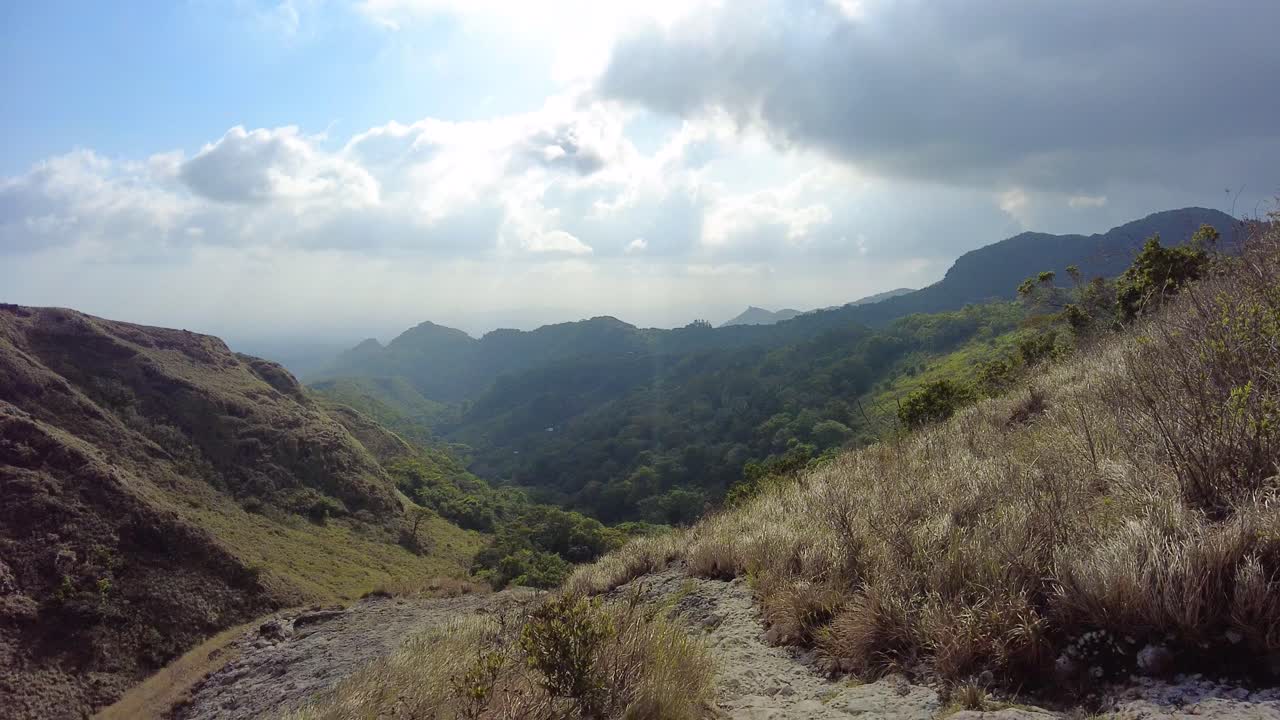 Reaching the highest point of the mountain, the world below unfolds before your eyes in a mesmerizing display of natural beauty