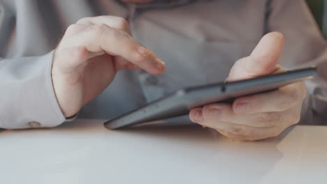 person using a tablet