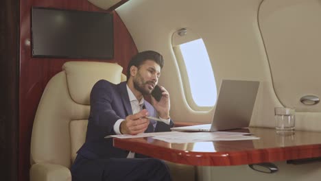 businessman talking on the phone .