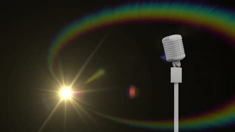 animation of light and vintage microphone on black background