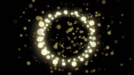 animation of golden dots and round christmas lights on black background