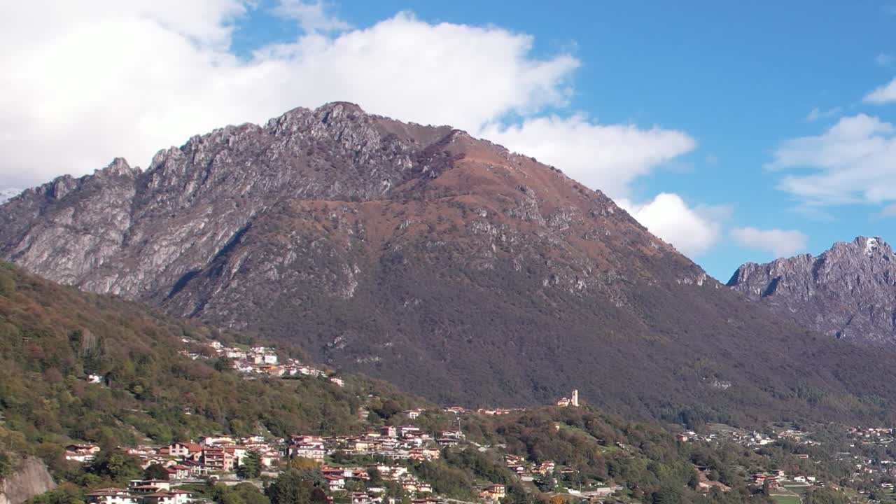 Stunning aerial view of the Italian Alps showcasing mountains and village