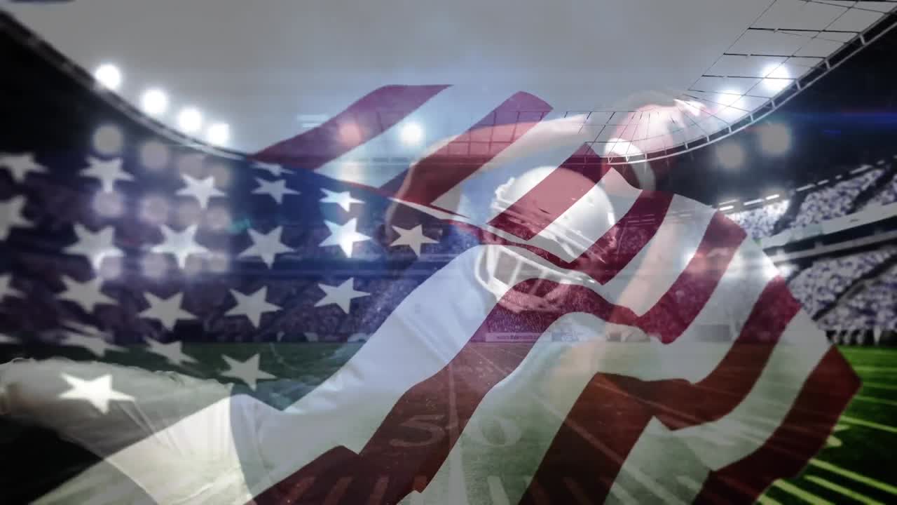 럭비 선수 가 다이빙 하는 동안 공 을 잡고 있다