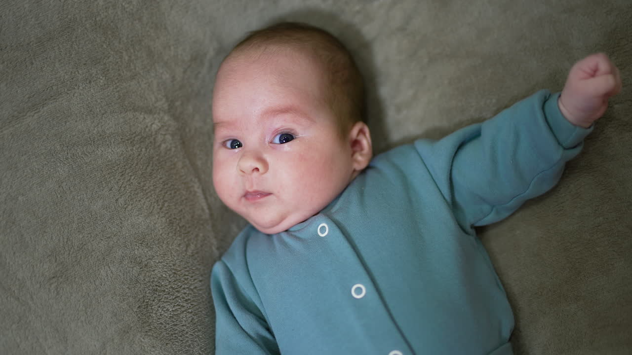 Baby in Green Jumpsuit