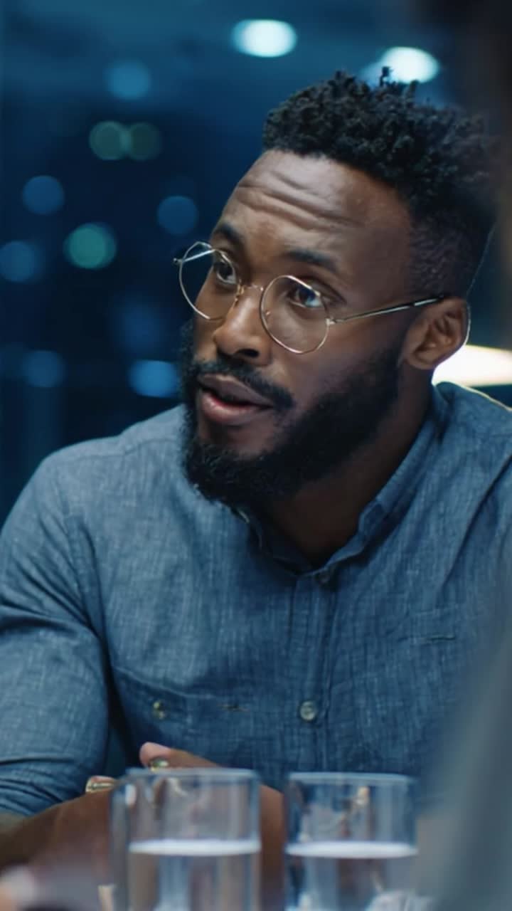 Engaging Conversation: A Thoughtful Individual in a Professional Setting Reflects on Ideas During a Meeting with Clear Focus and Attentiveness Among Peers