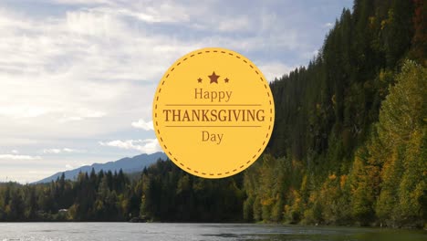 animation of happy thanksgiving day text over autumn landscape in background