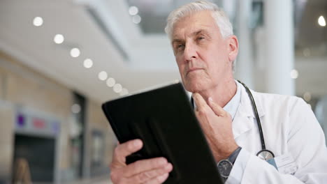 Doctor,-man-and-thinking-of-tablet-research