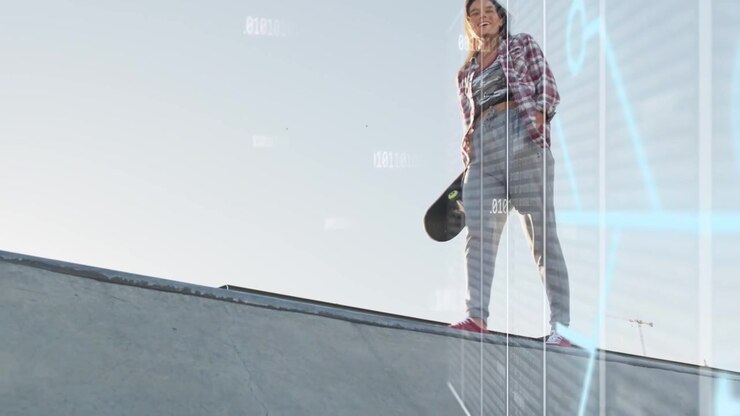 Woman skater stepping ramp walking to cam revealing board with blue holo overlay tracking for tech