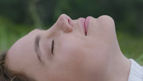 portrait happy woman lying on grass enjoying peaceful meditation resting in nature exploring carefree lifestyle