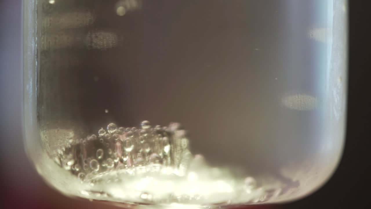 Wedding ring in a glass of water