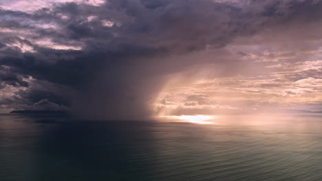 dramatic colorful cloudy sunset in costa rica over the ocean aerial