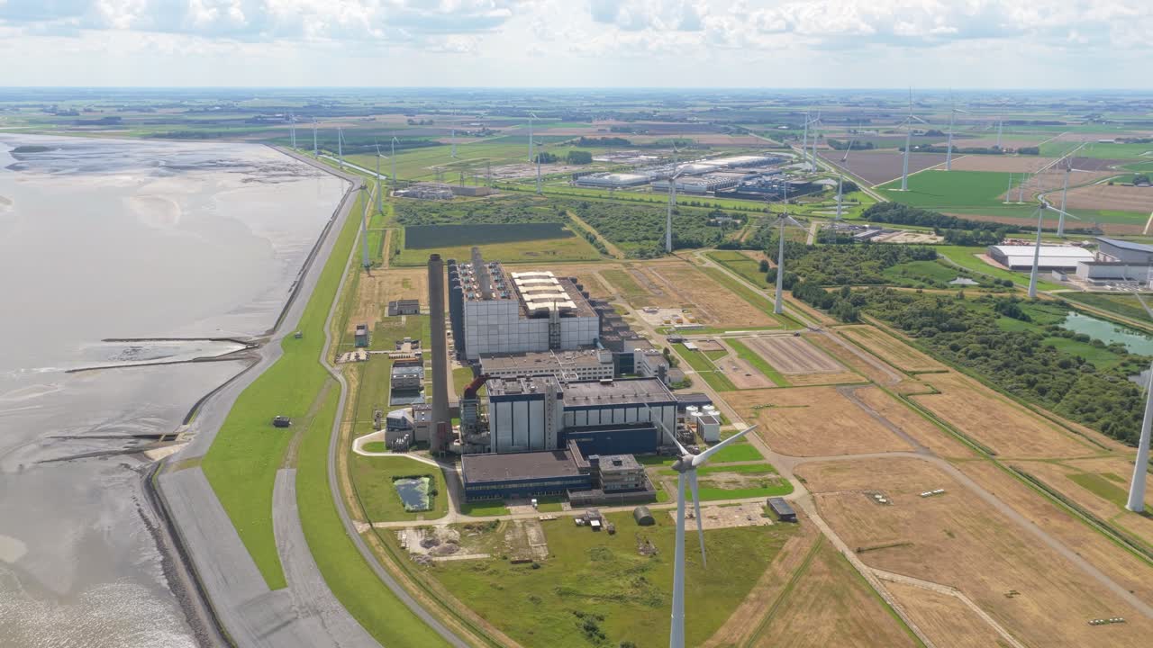 Drone video of energy production site and power plant at Dutch Eemshaven