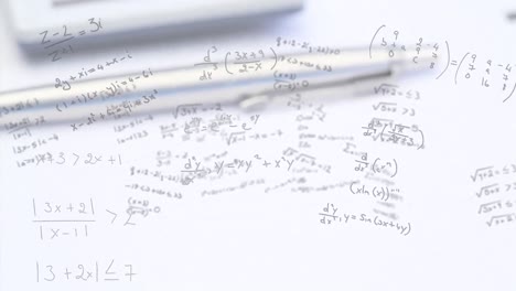 Animation-of-math-equations-with-keyboard-and-pen-on-white-desk