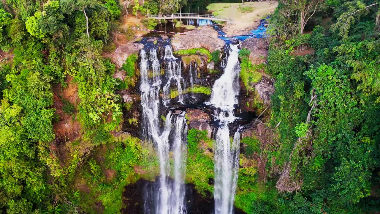 Aerial Establishing at Pakse Loop Waterfall, one of tallest cascades in Southeast Asia, Bolaven Plateau, green tropical environment