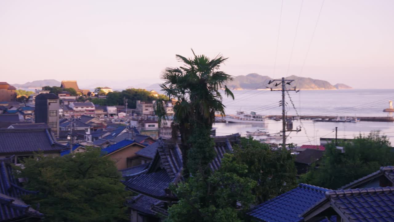 Scenic View of Japanese Town and Coastline