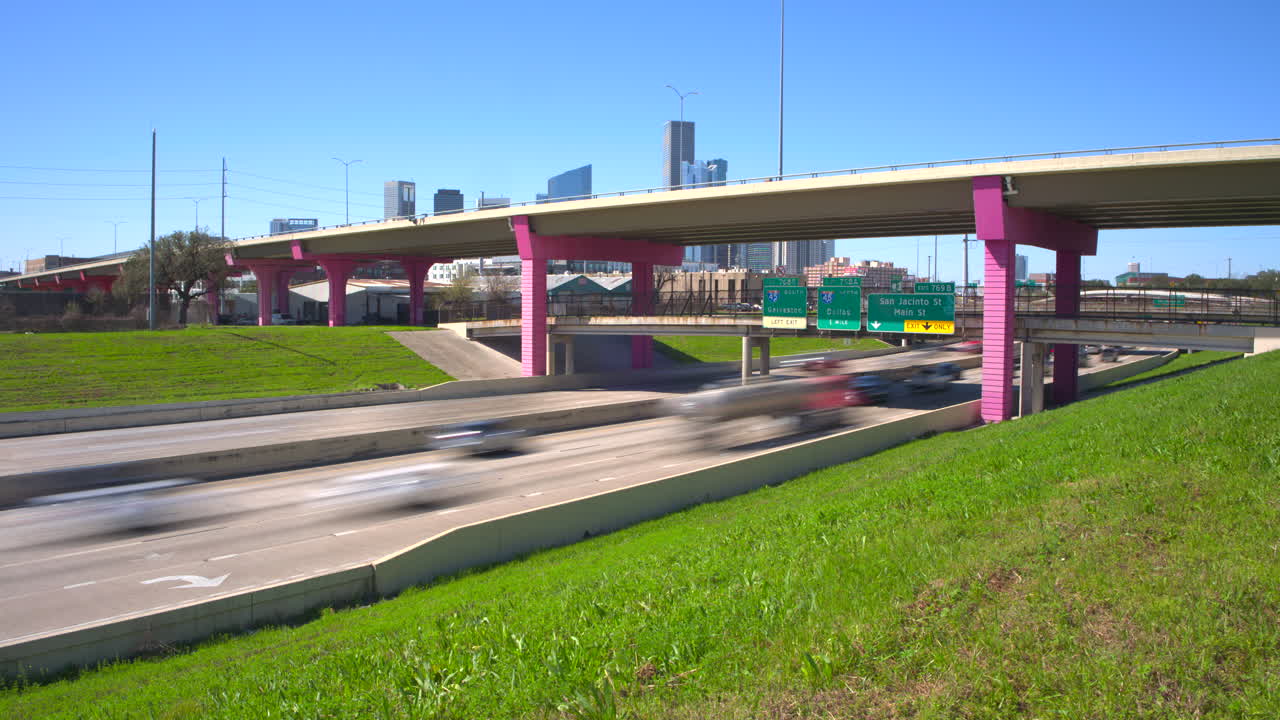 Bright sunny day I-10 East freeway timelapse of cars in Houston, Texas