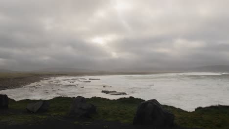 waves crashing in the coast of county mayo on a stormy day