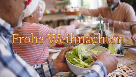 animation of frohe weihnachten text over diverse senior friends sitting at table at christmas