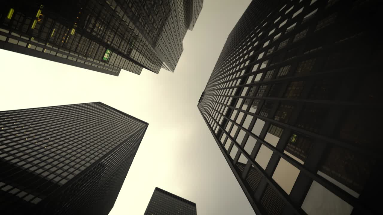 Black skyscraper from below in rotation.