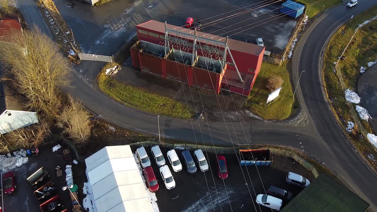 Flying over an industrial part of a small town in Norway - aerial view