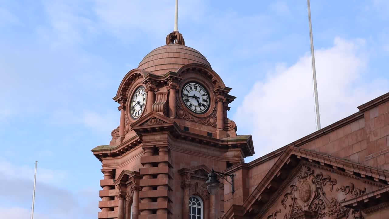 Close-up view of the historic Nottingham Railway Station Clock Tower, a landmark in the heart of Nottingham city centre, England, showcasing its architectural details and heritage design