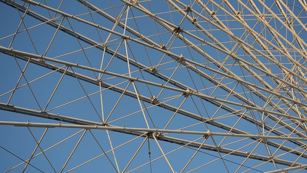 Big wheel against the sky. Shooting in the evening