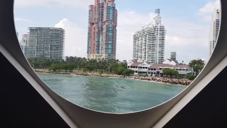 This video takes you on a journey through a vibrant city, displaying stunning views from a boat, cruise ship, and airplane window