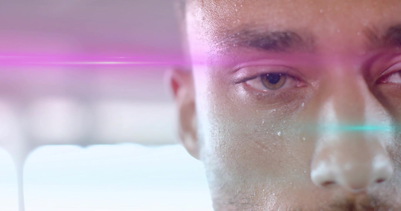 Luz de gel rosa deslizándose por la boca causando cambios en la respiración del hombre y apertura de ojos para tecnología de belleza