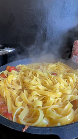 cooking creamy tomato fettuccine