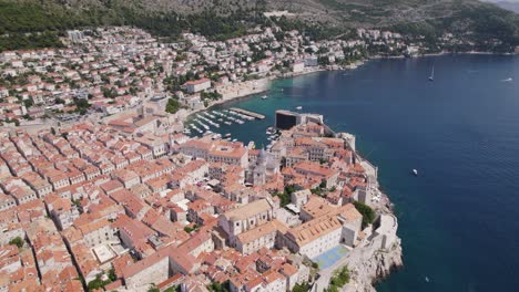 High-angle-drone-view-over-Dubrovnik-Old-Town-and-port,-Croatia