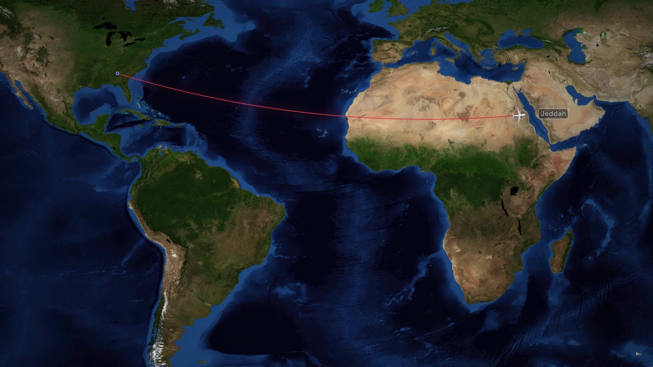 Satellite world map animation tracks a plane flying from Atlanta to Jeddah with red line