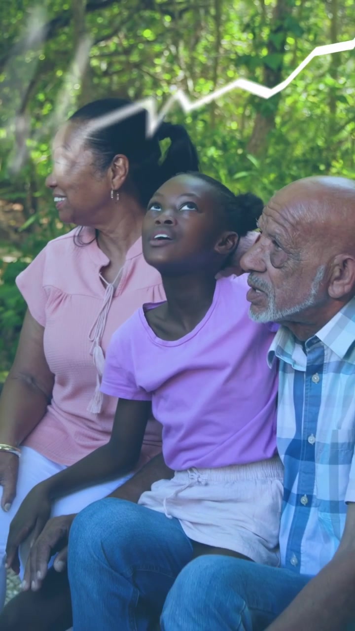 Vertical video: Elders kid pointing above sparking tan bars white zigzag obscuring group for design