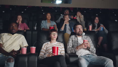 people watching a movie in a theater